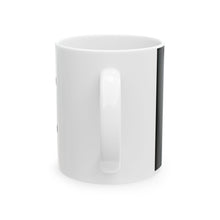The Test Pattern Mug by Pixel Threads. Ceramic mug seen from the side with the handle turned away., view 3